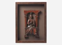 A carved architectural element of an American Indian with a Pipe, South Carolina, 19th century