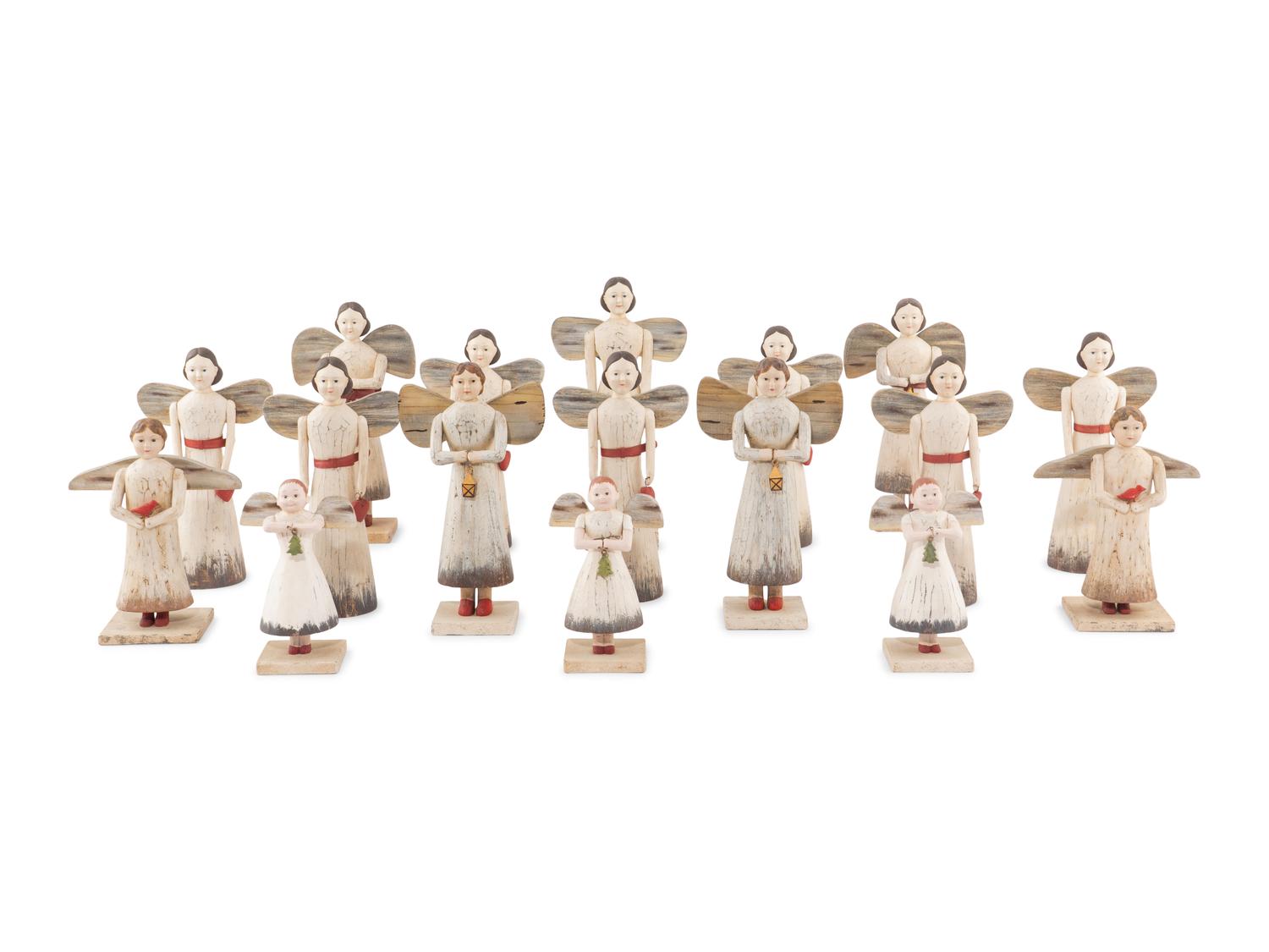 A Set of Seventeen Painted and Carved Wood Angel Candlesticks