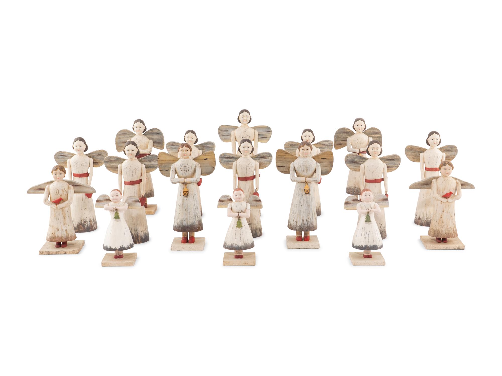 A Set of Seventeen Painted and Carved Wood Angel Candlesticks