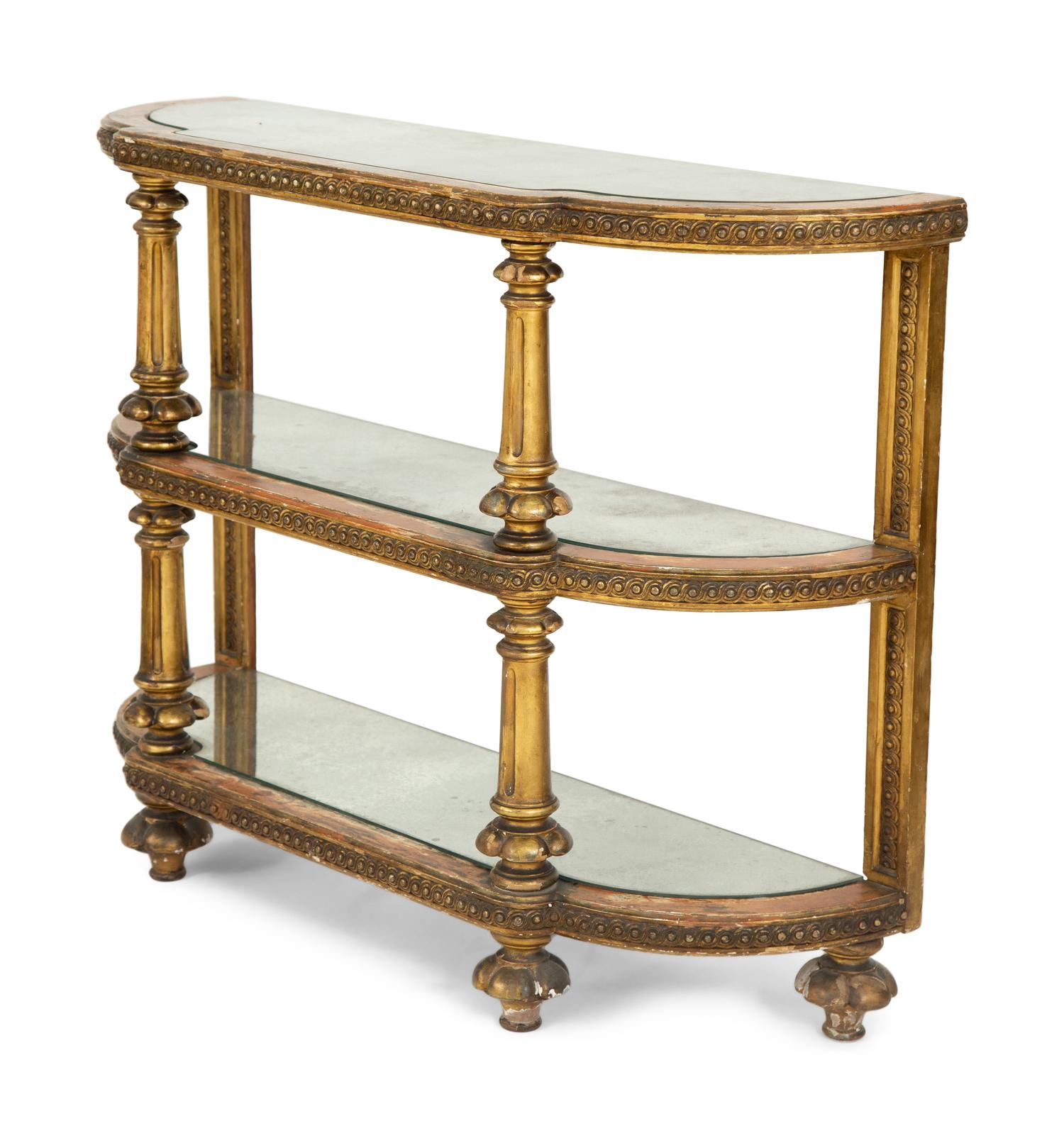 An Italian Carved and Painted Three Tier Etagere Console