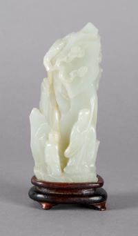 A Celadon Jade Carving of a Mountain, Height 4 1/4 inches.