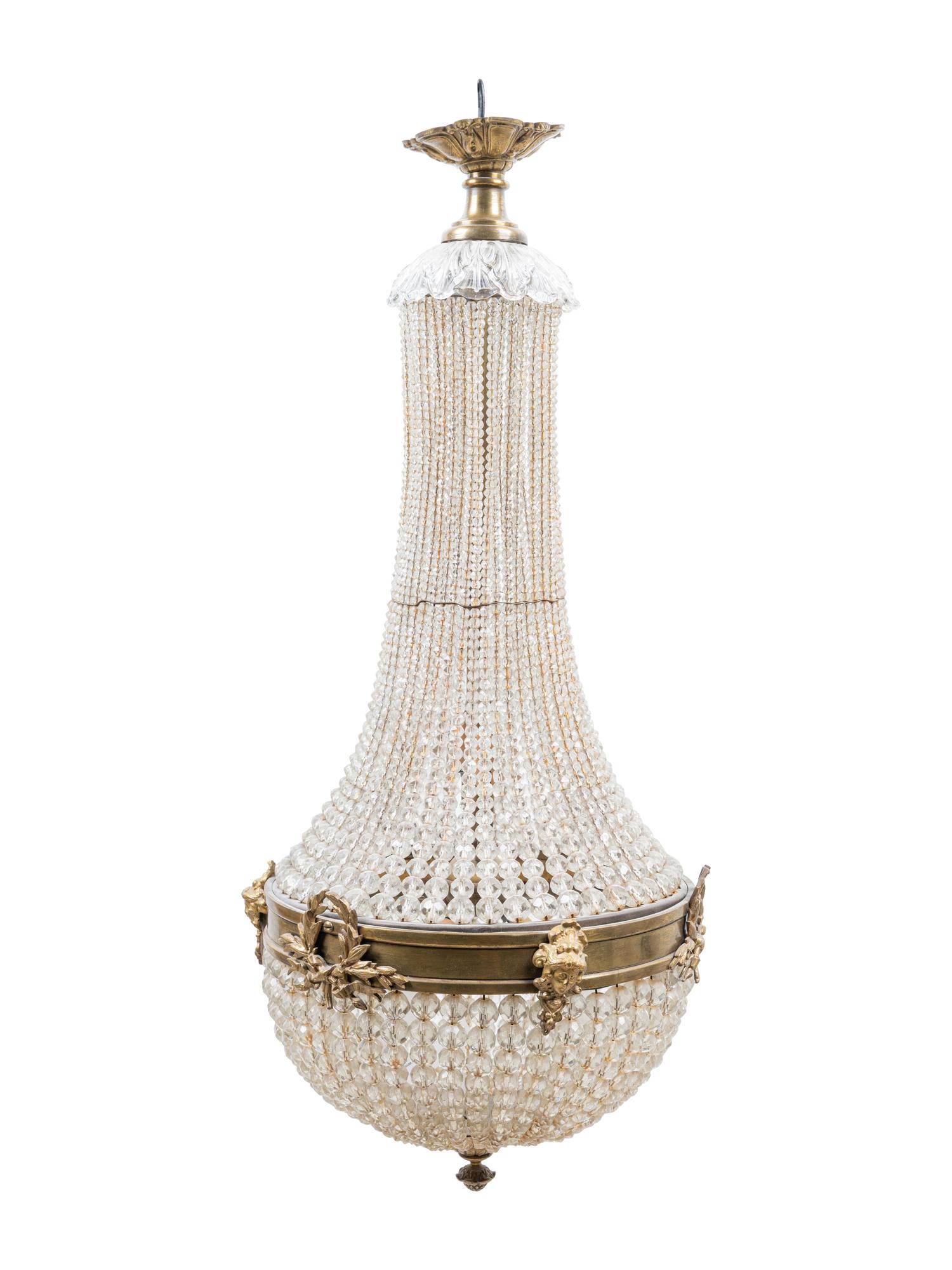 An Empire Style Gilt Metal and Beaded Glass Chandelier
