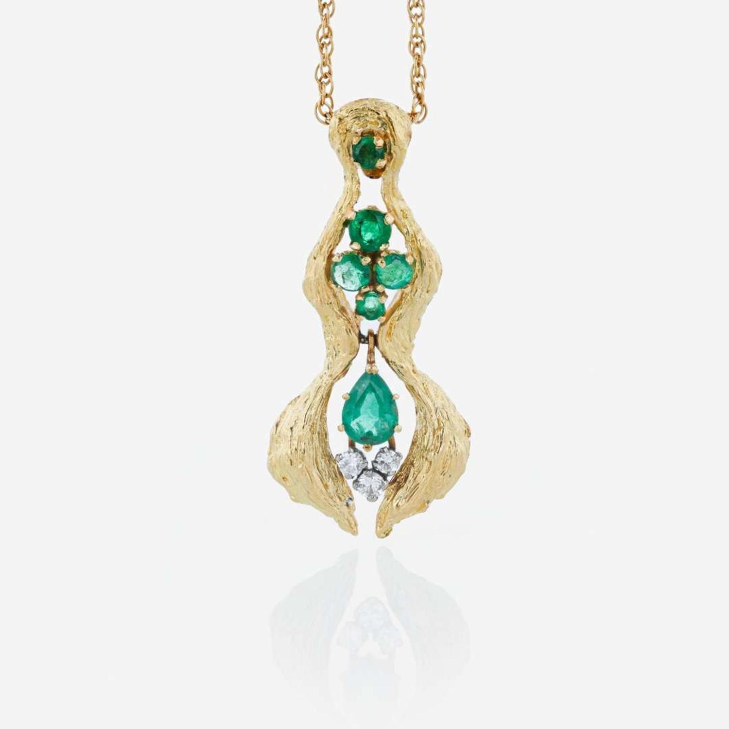 An 18K yellow gold, emerald, and diamond necklace