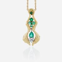 An 18K yellow gold, emerald, and diamond necklace
