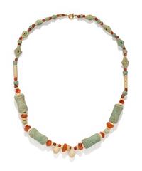 A Near Eastern Faience and Carnelian Bead Necklace
