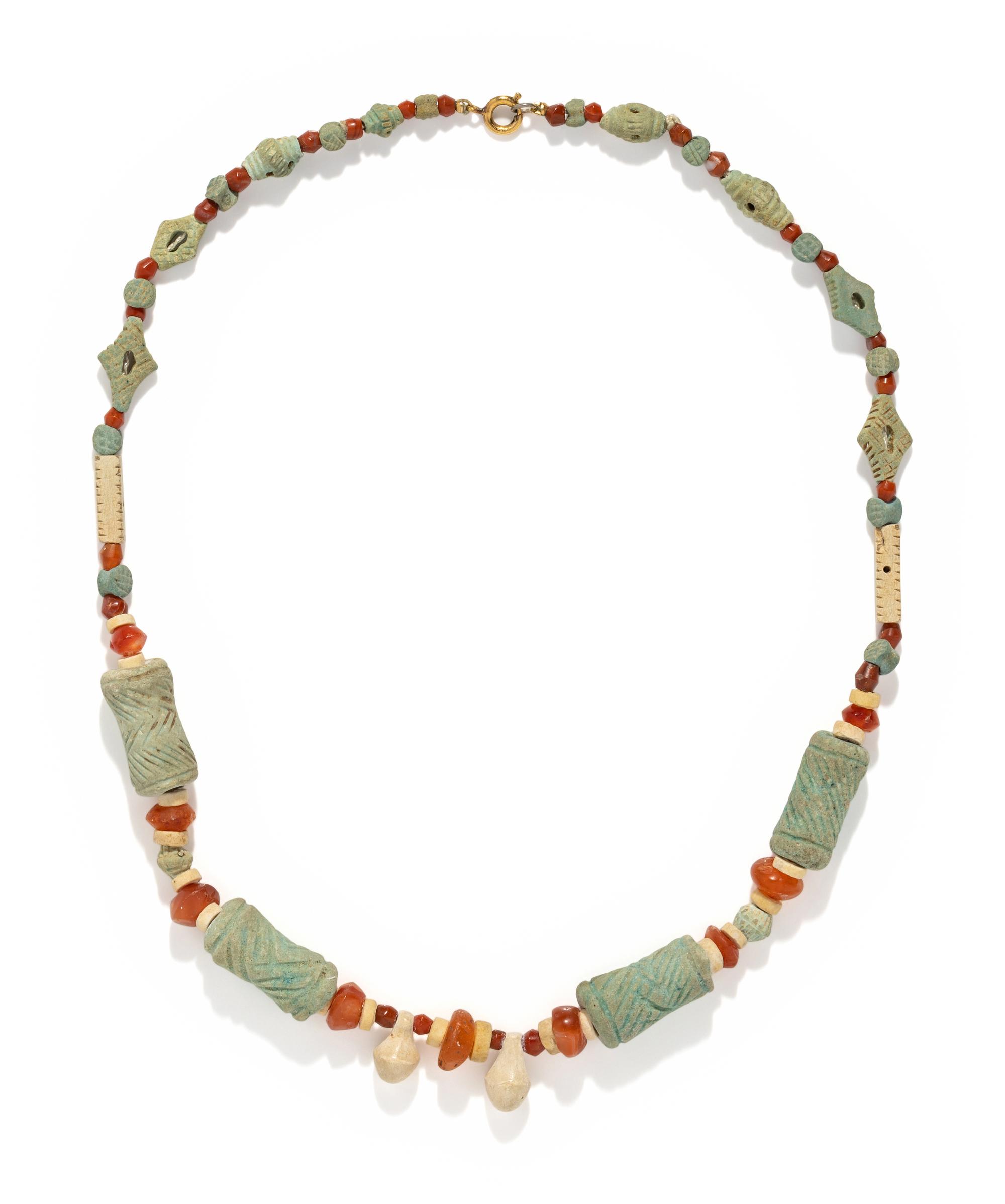 A Near Eastern Faience and Carnelian Bead Necklace