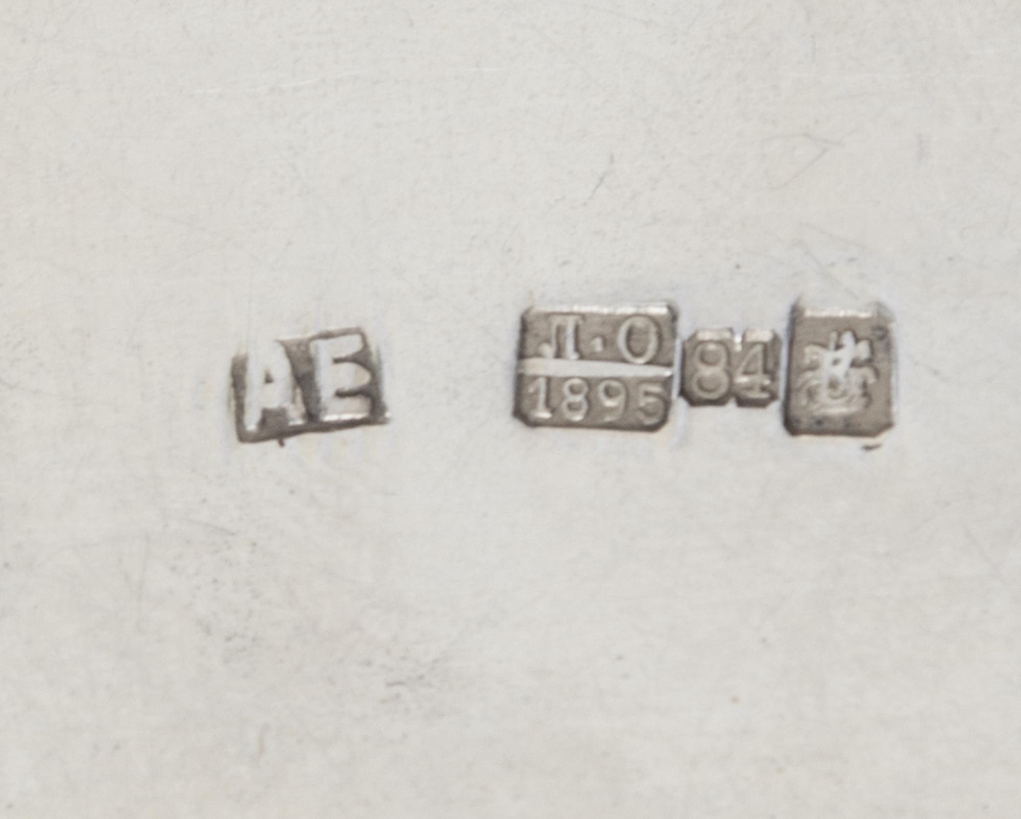 A Russian Niello Silver Cigarette Case, Mark of Alexander Yegarov, Assay of Lev Oleks, Moscow, 1895, the lid worked to show a man drivi