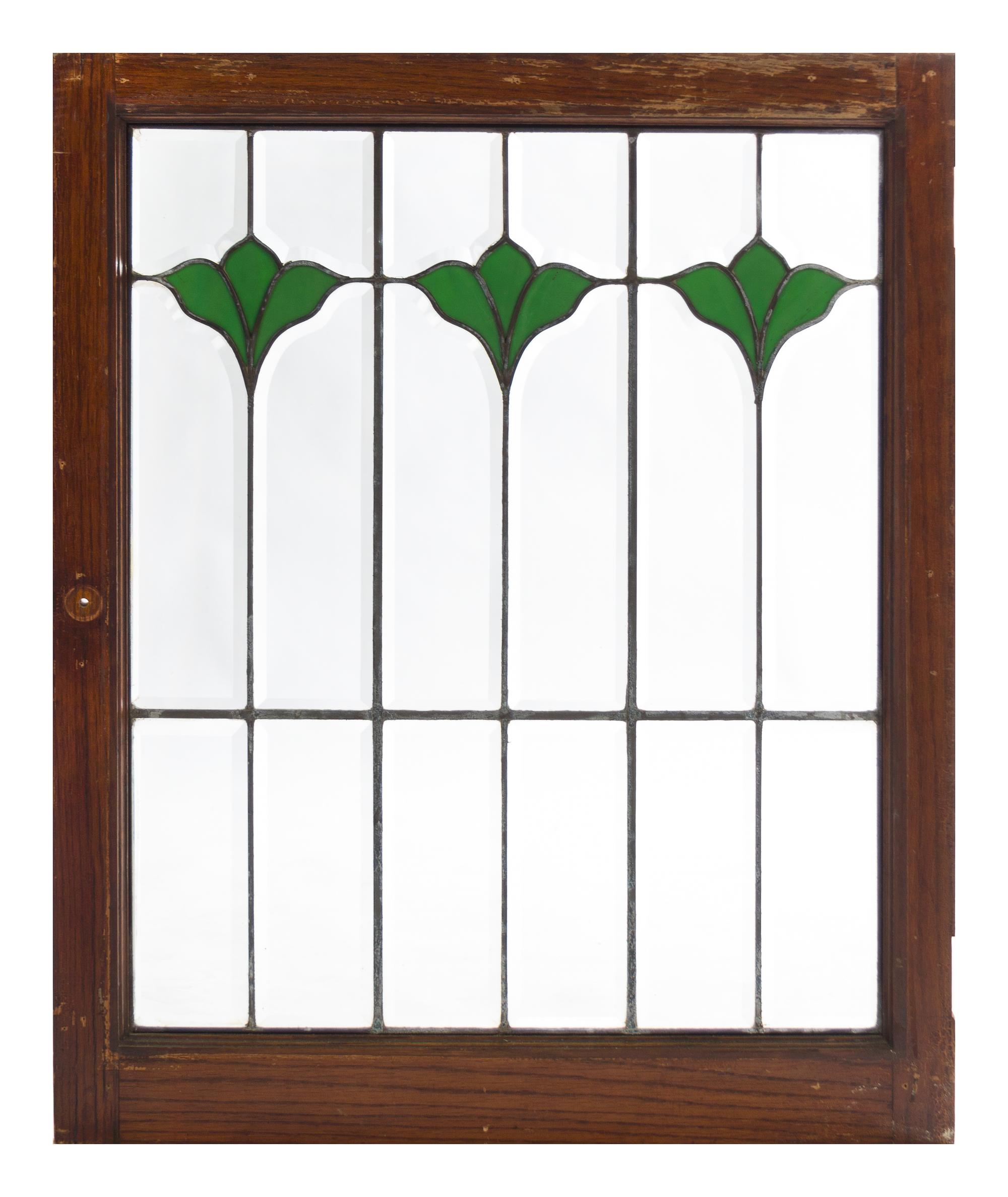 A Leaded Glass Window Height 33 1/2 x width 26 1/2 inches.