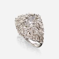 An eighteen karat gold and diamond ring