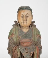 A Chinese Carved Wood Standing Figure with Polychrome Decoration