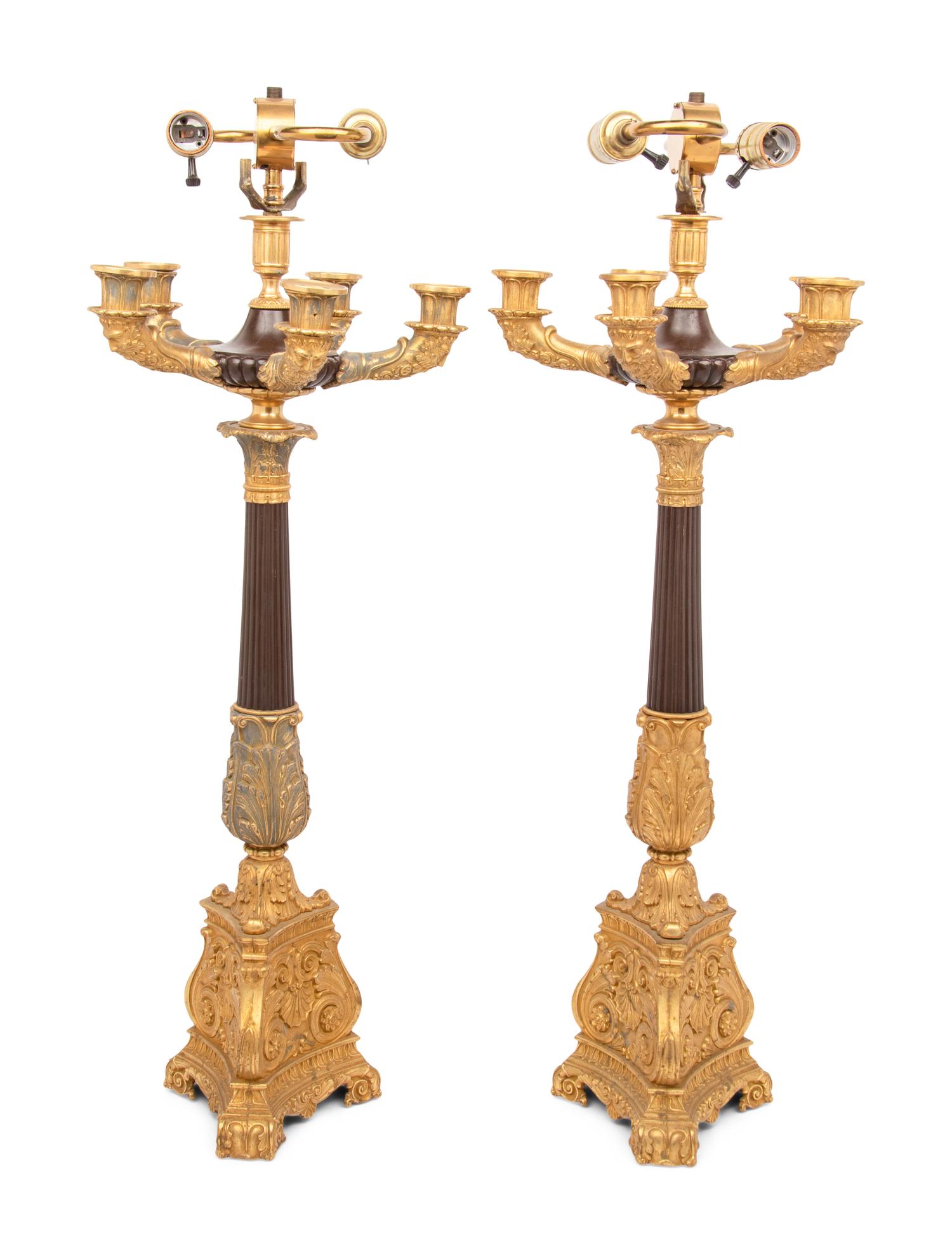 A Pair of Louis-Philippe Gilt and Patinated Bronze Five-Light Candelabra