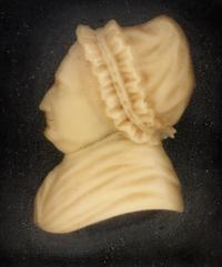 A Pair of Wax Portrait Busts of George and Martha Washington