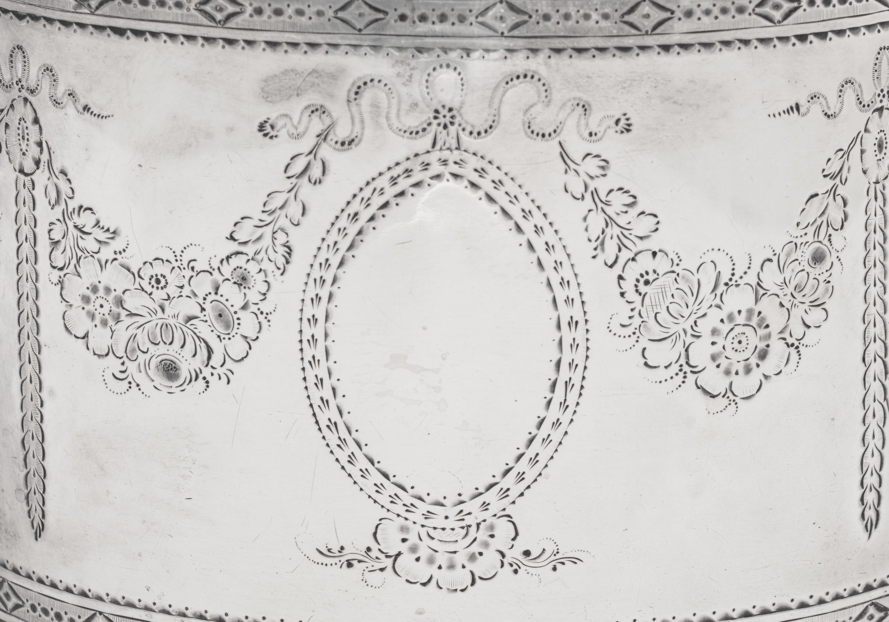 Two Hester Bateman George III Silver Teapots and a Teapot Stand