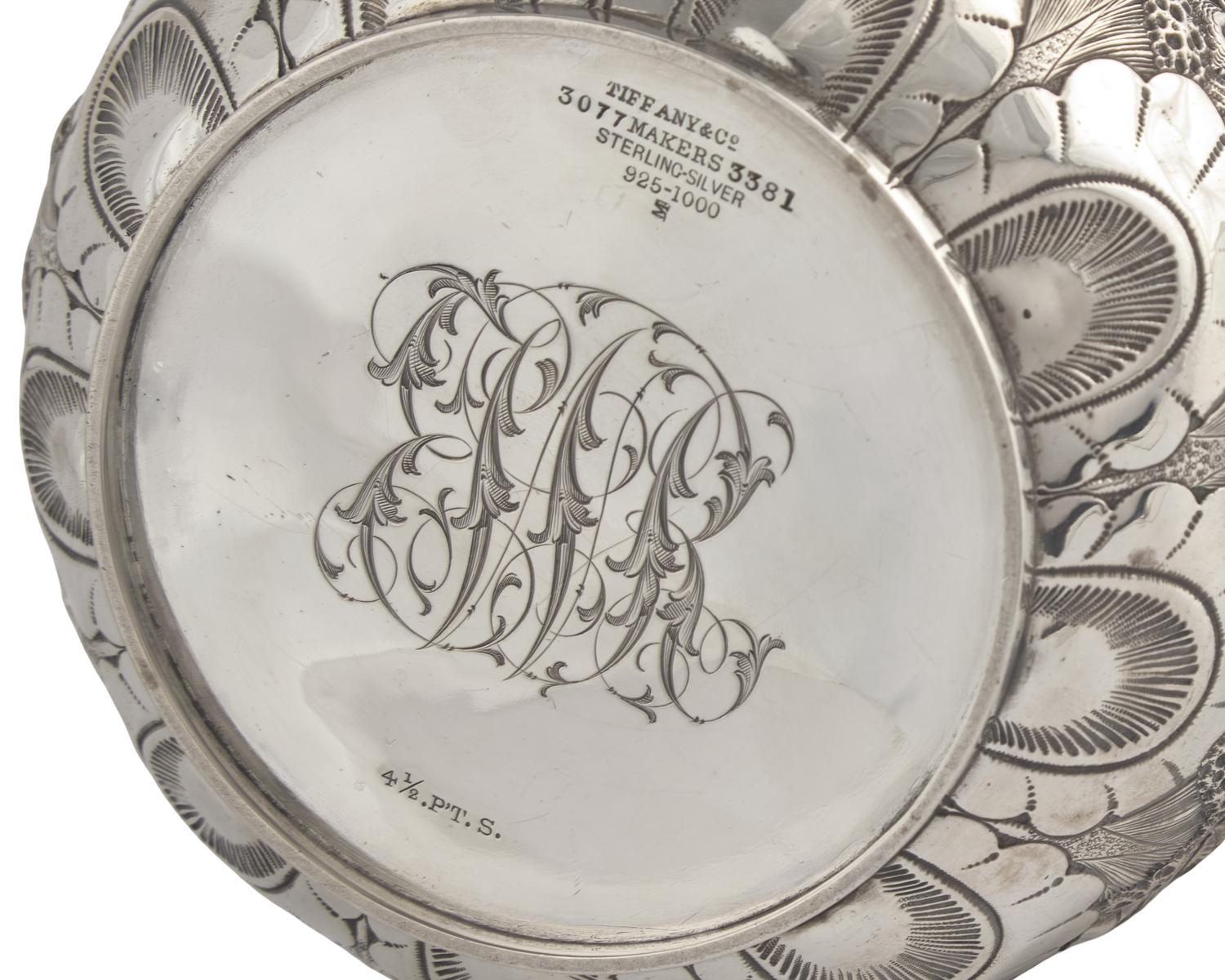 A Sterling Silver Floral Repousse Water Pitcher, Tiffany & Co., New York, NY, Circa 1880