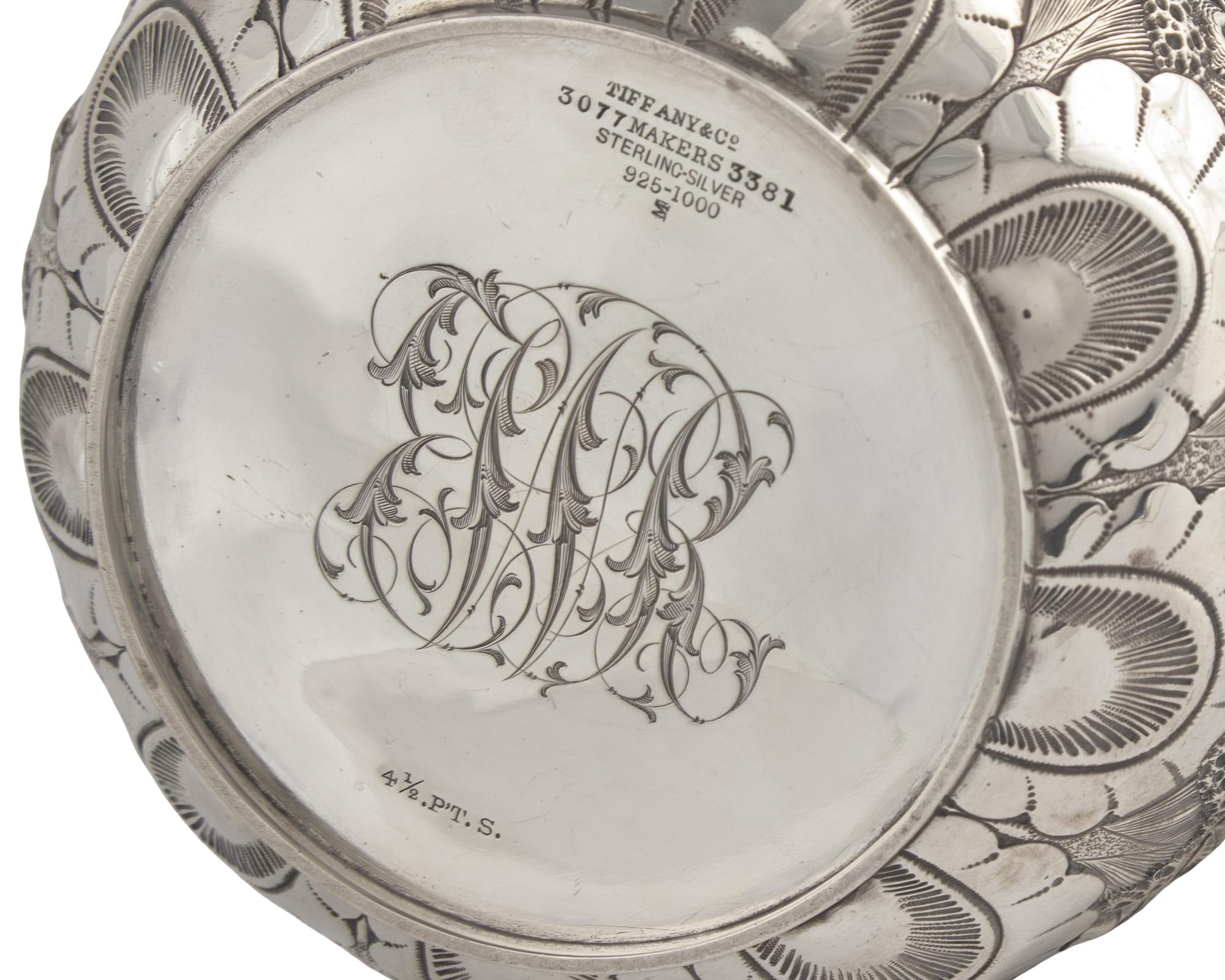 A Sterling Silver Floral Repousse Water Pitcher, Tiffany & Co., New York, NY, Circa 1880