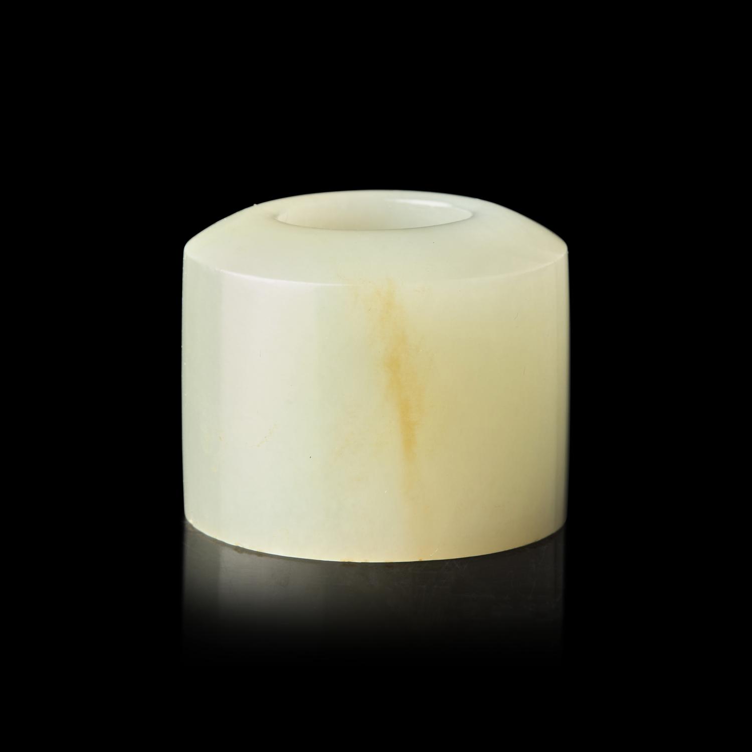 A Large Chinese Pale Celadon Jade Archer's Ring, 18th/19th Century 清中期 白玉扳指一枚