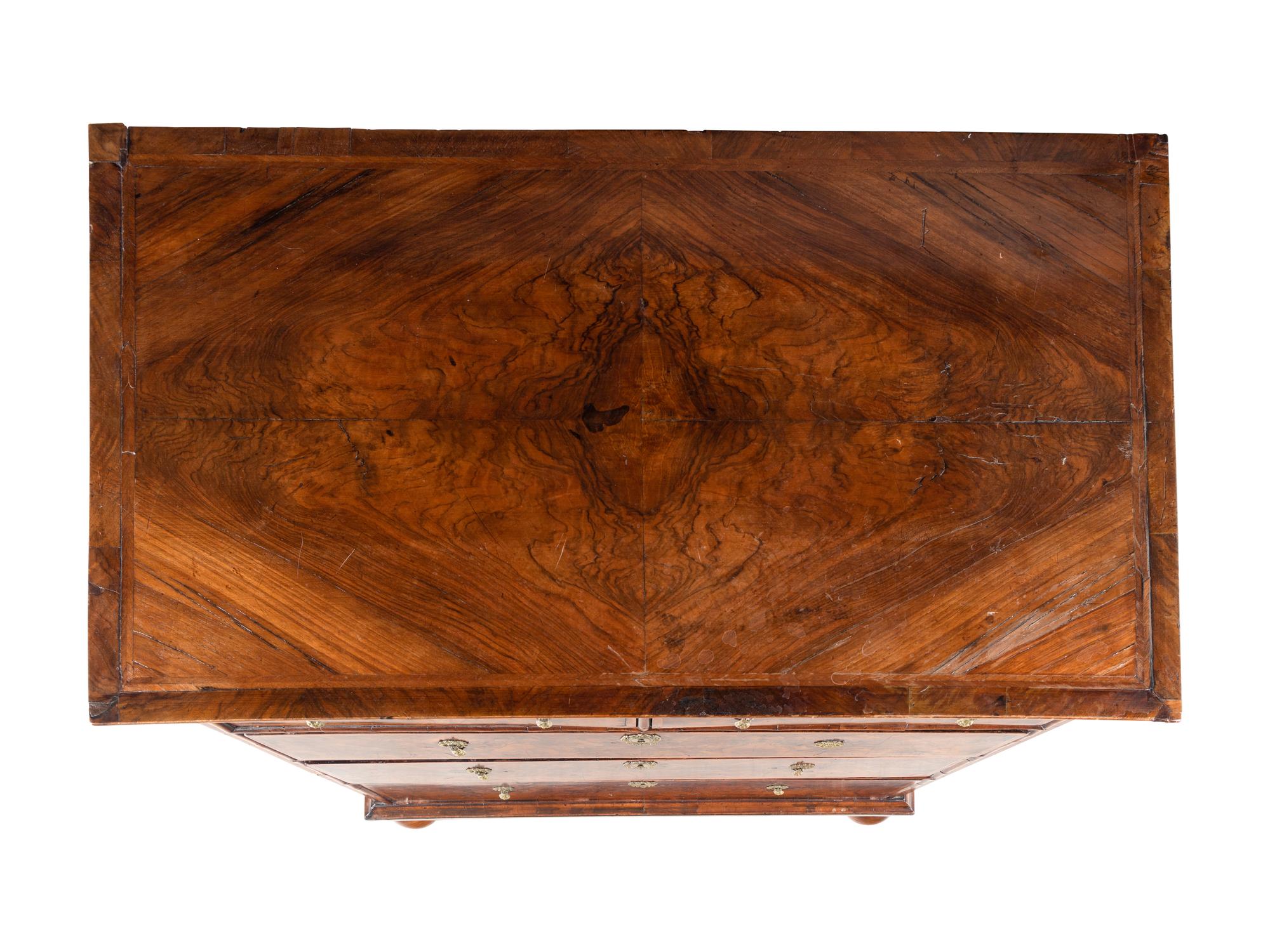 A George II Walnut Chest of Drawers