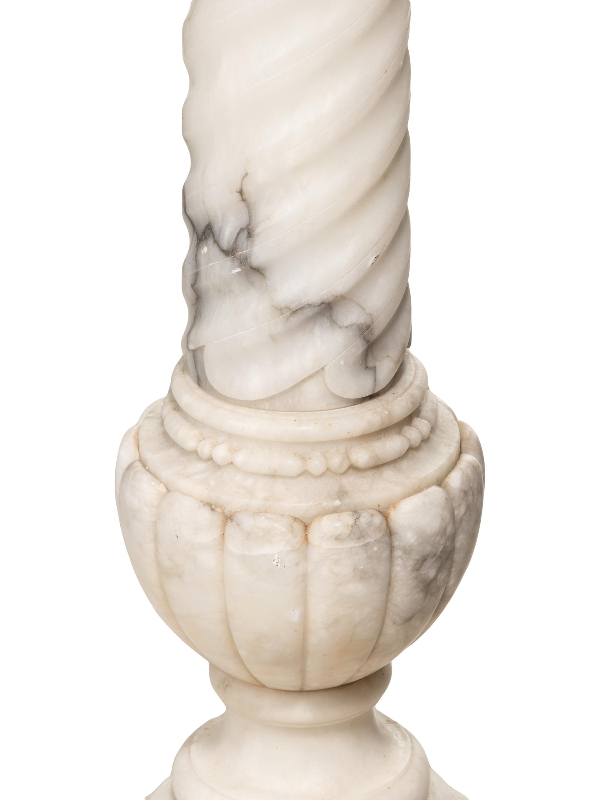 A Continental Carved Marble Pedestal