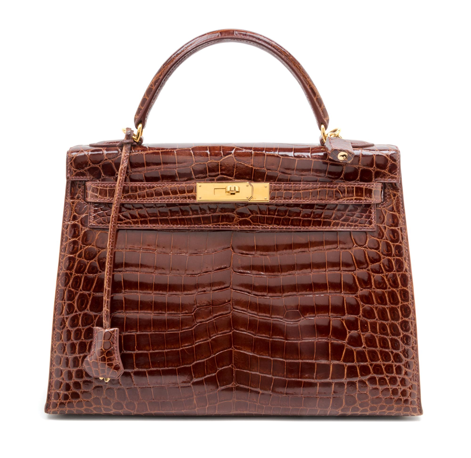 An Hermes Brown Niloticus Crocodile Sellier 32cm Kelly Handbag, 12.5" x 5" x 9.5"; Handle drop: 3.25".