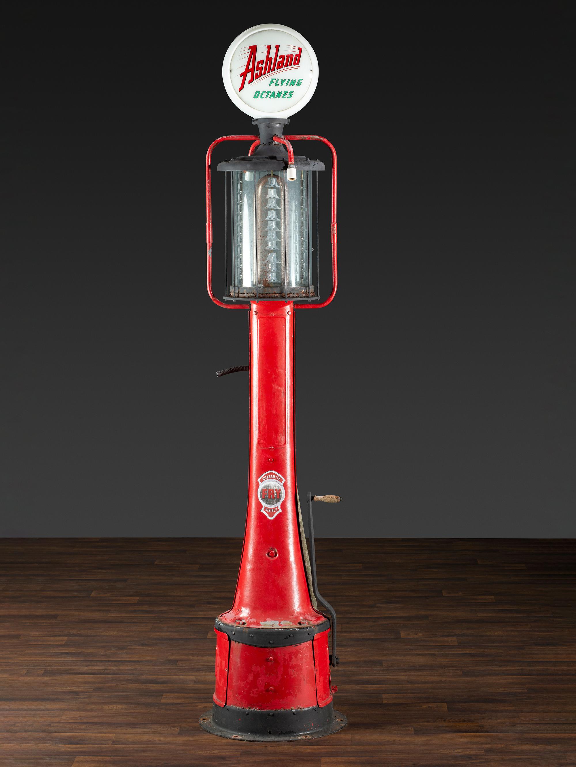 An American Painted Metal Gravity Gas Pump, Guarantee Liquid Measure