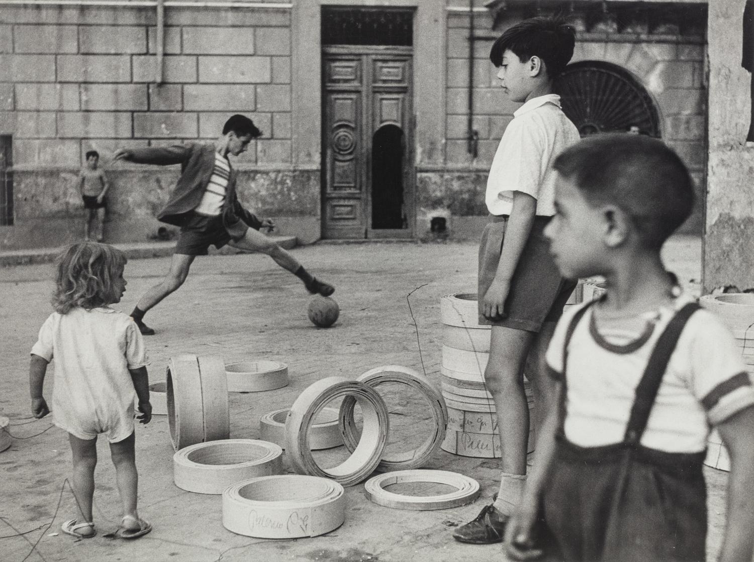 Herbert List (1903-1975) Boys Playing Football, Naples, 1959