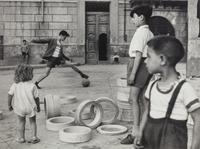 Herbert List (1903-1975) Boys Playing Football, Naples, 1959
