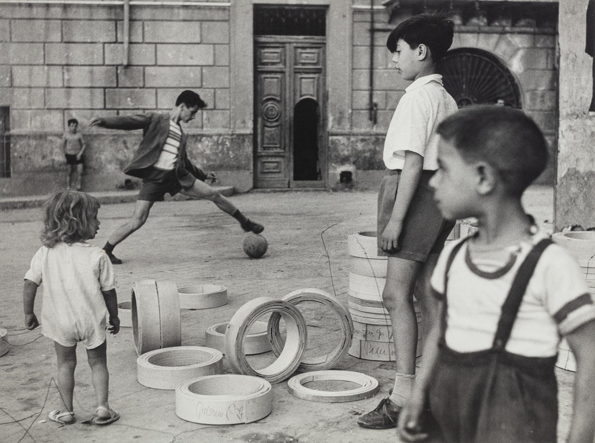 Herbert List (1903-1975) Boys Playing Football, Naples, 1959