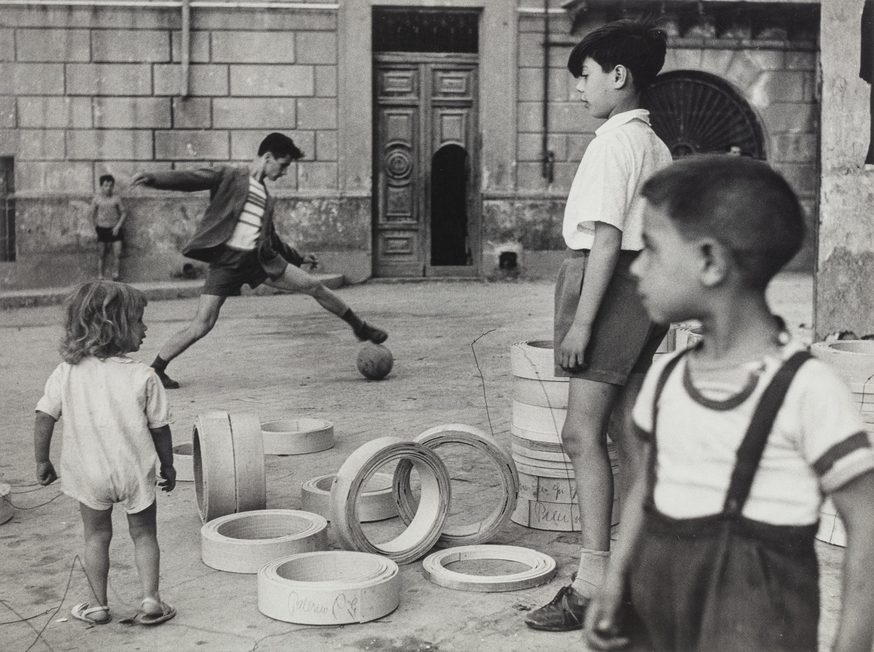 Herbert List (1903-1975) Boys Playing Football, Naples, 1959