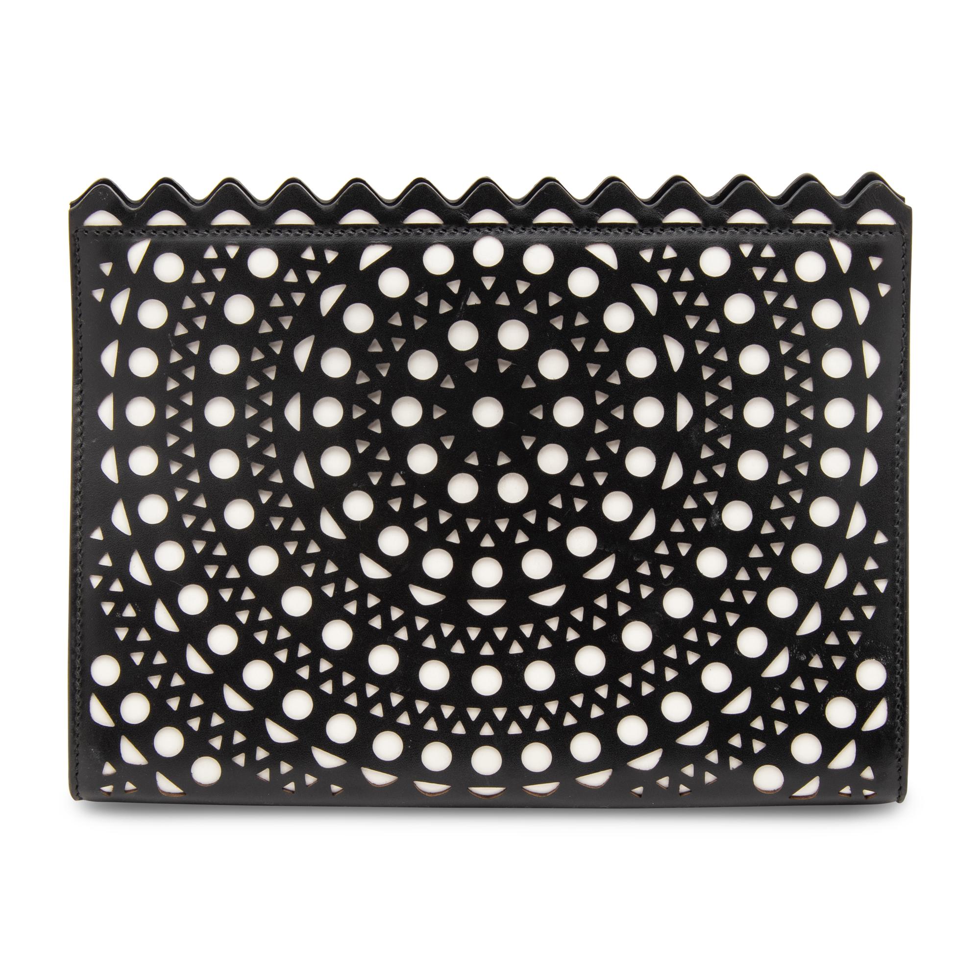 ALAÏA, LASER-CUT LEATHER CLUTCH
