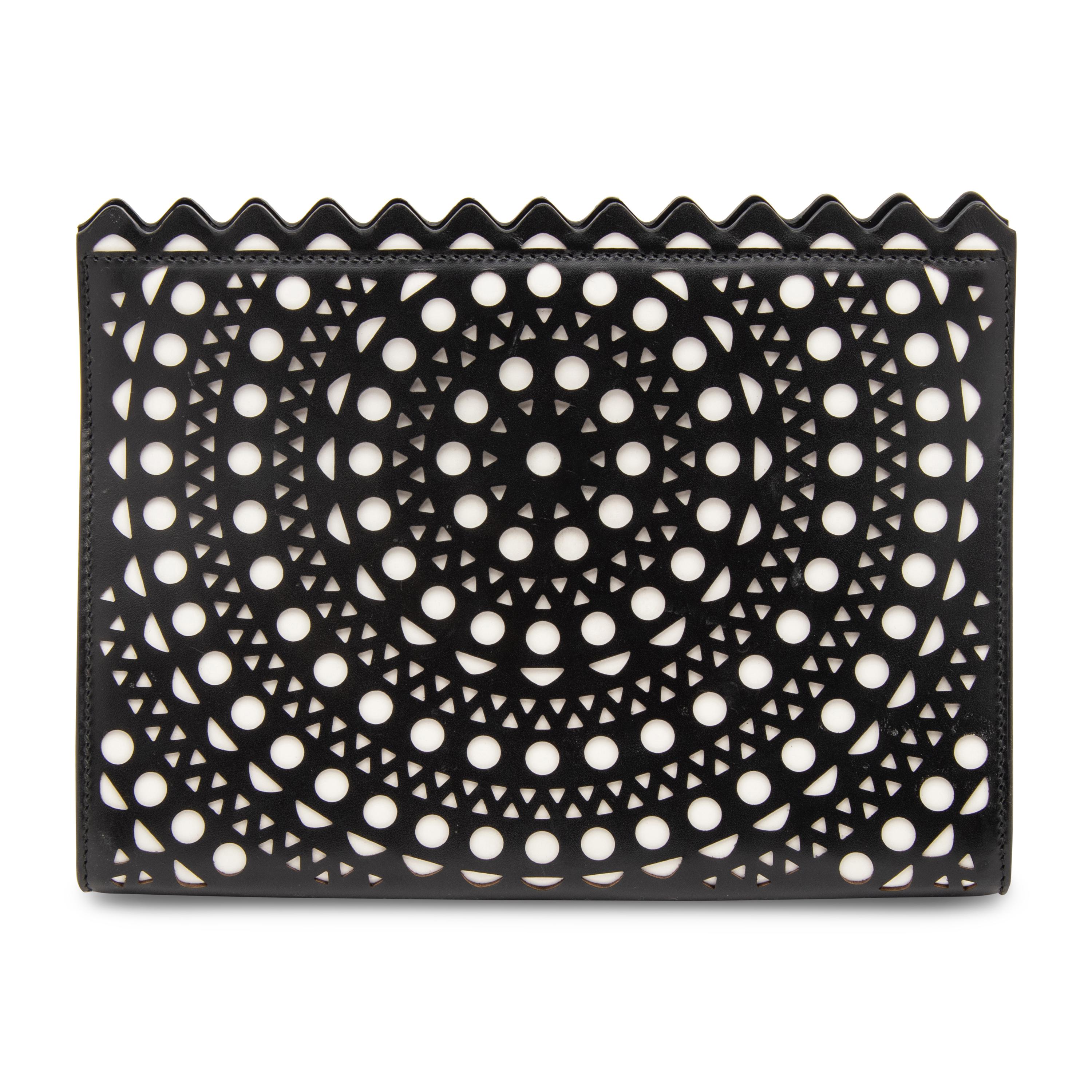 ALAÏA, LASER-CUT LEATHER CLUTCH