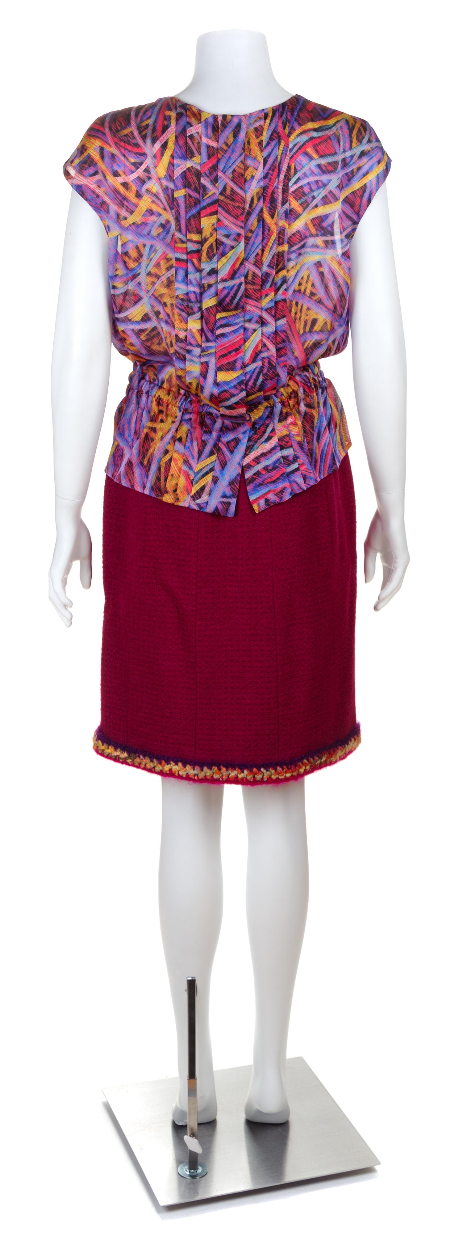 A Chanel Raspberry Wool Boucle Skirt Suit Ensemble, Size 40.