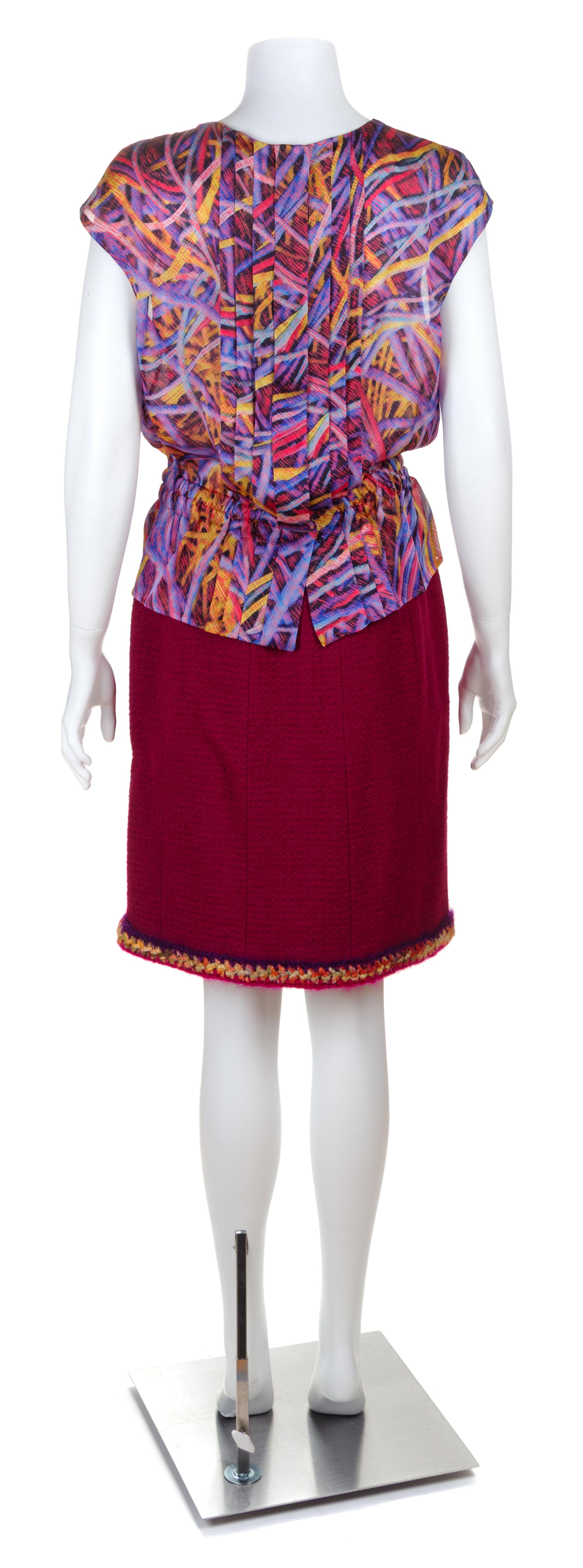 A Chanel Raspberry Wool Boucle Skirt Suit Ensemble, Size 40.