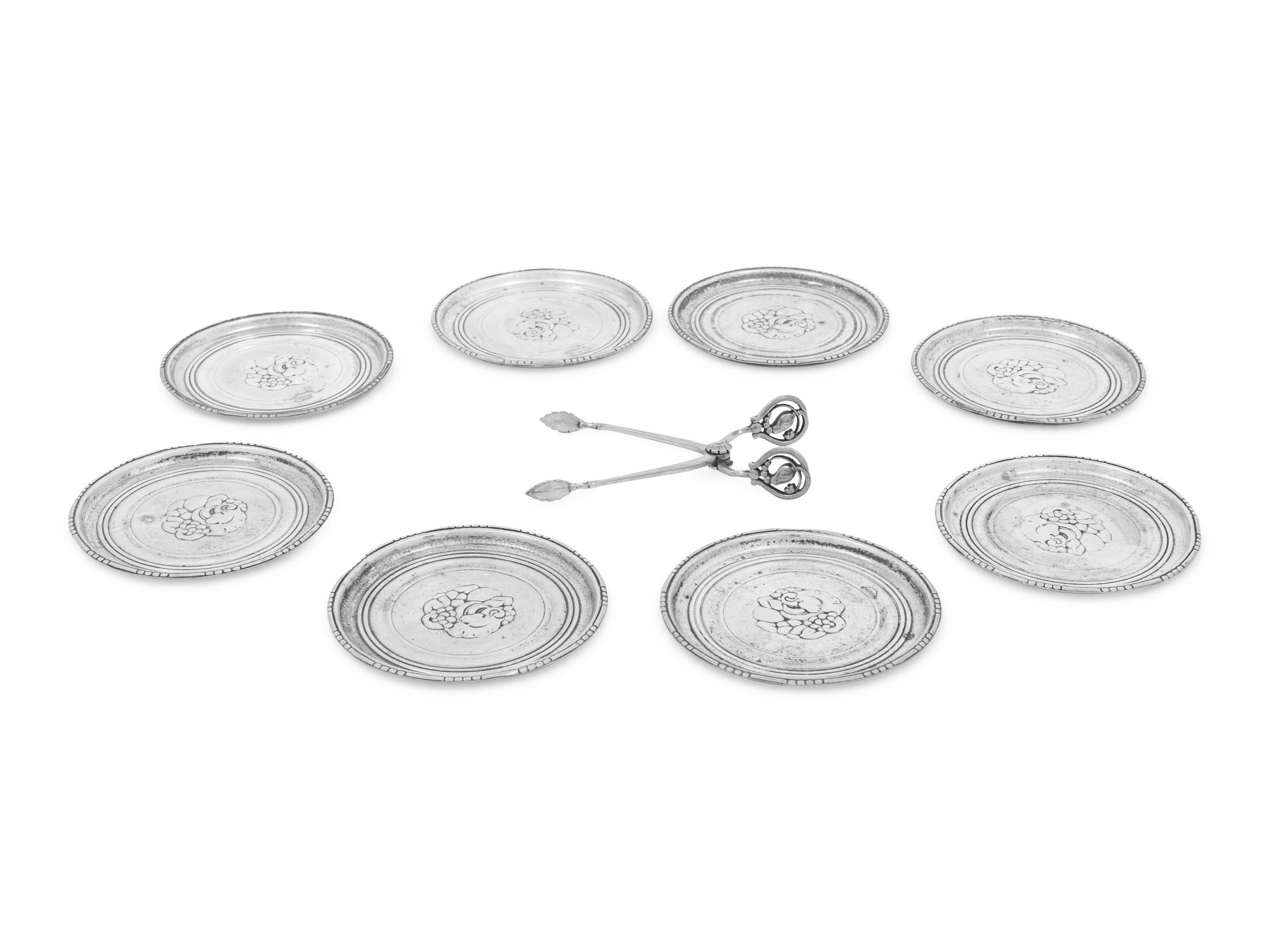 A Set of Eight Georg Jensen Silver Coasters