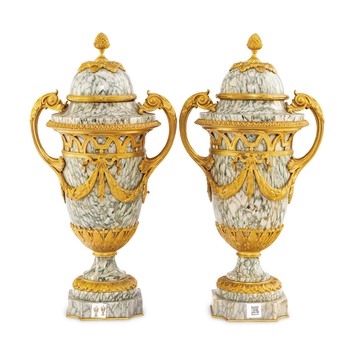 A Pair of Louis XVI Style Marble and Gilt Bronze Mounted Urns