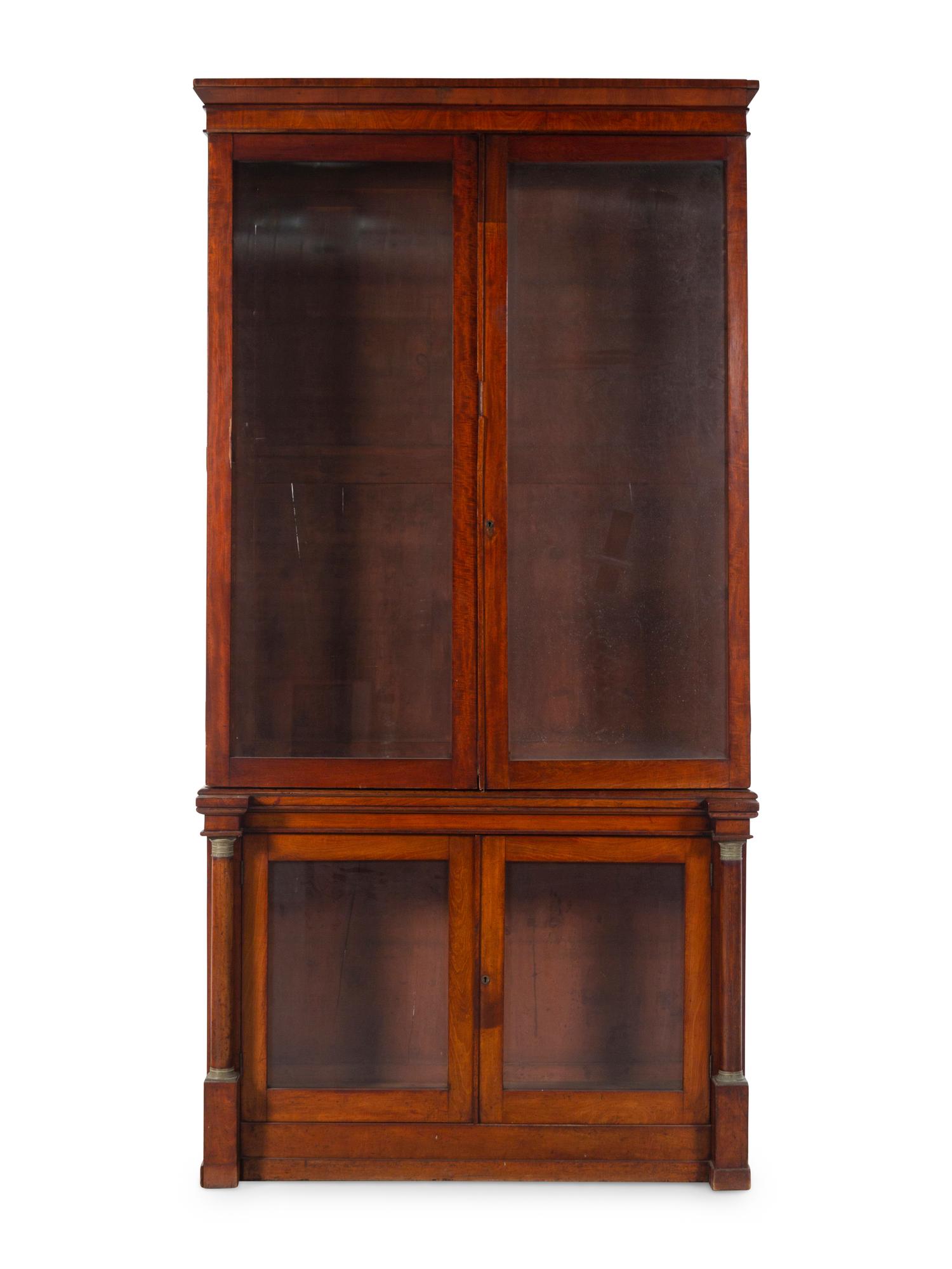 An Empire Style Walnut Bookcase
