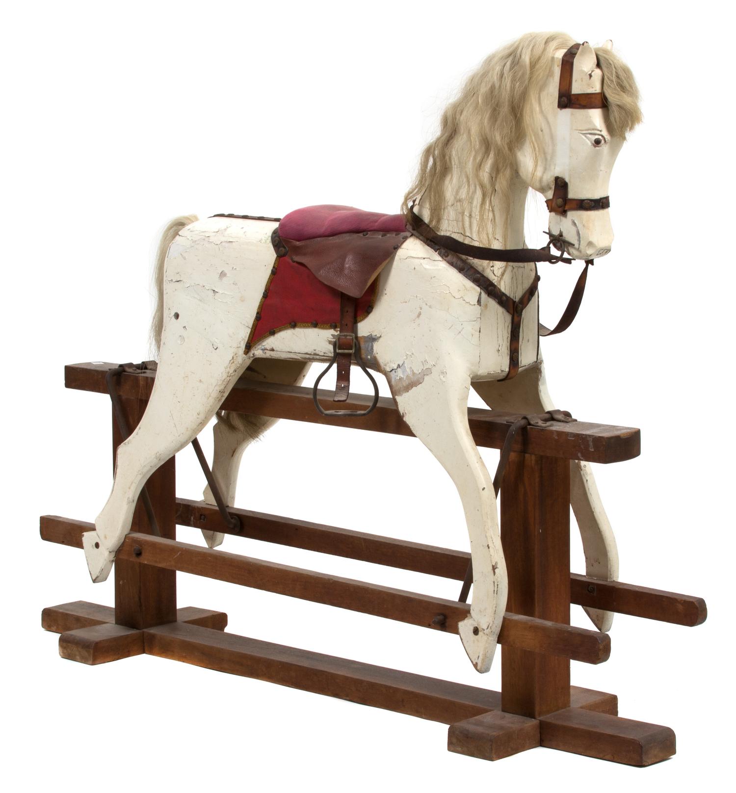 An American Primitive Painted Rocking Horse Height 46 x width 54 x depth 12 inches. — 19TH CENTURY