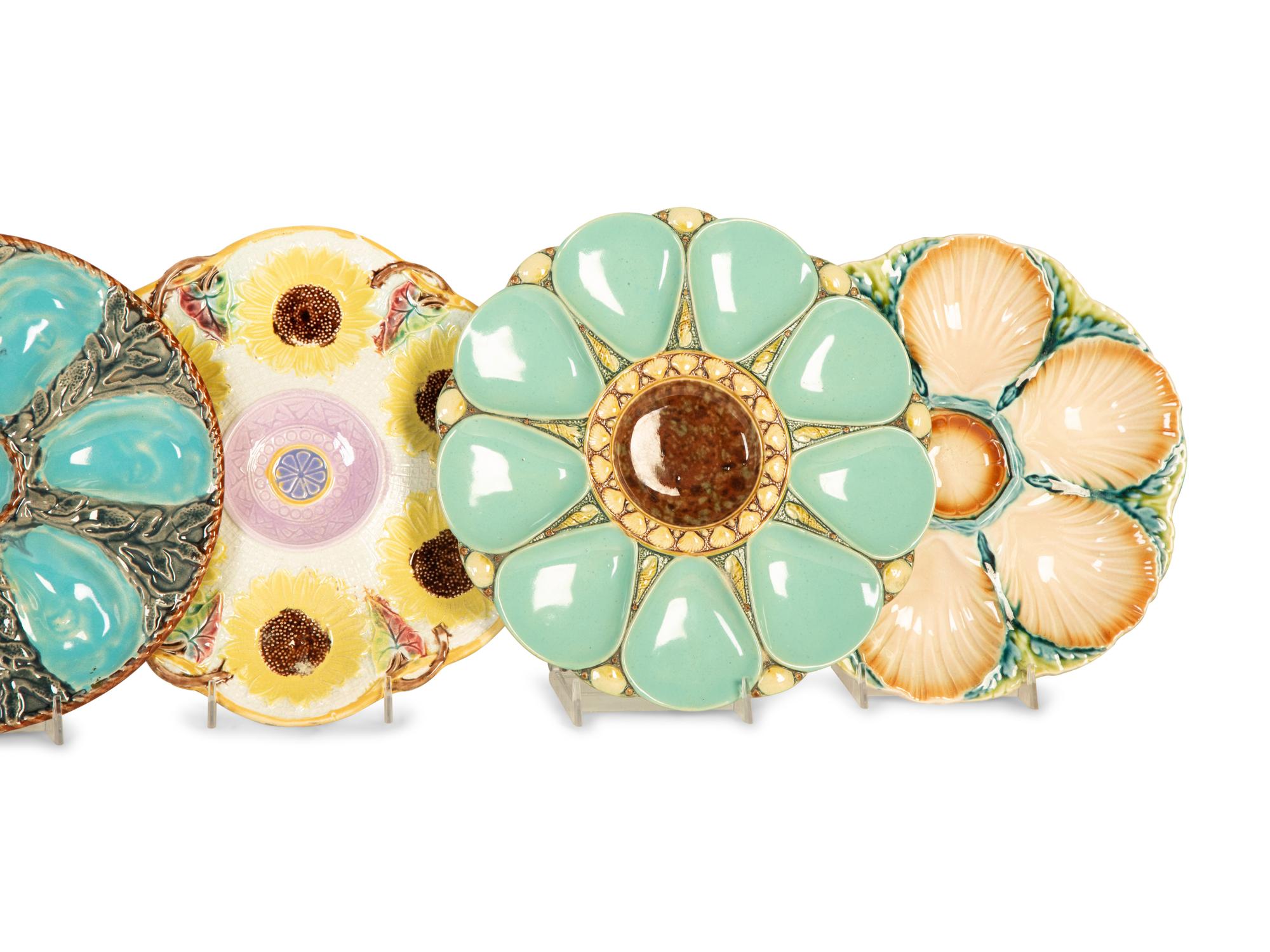 A Group of Eight English and French Majolica Six-Well Oyster Plates — Mid-19th Century