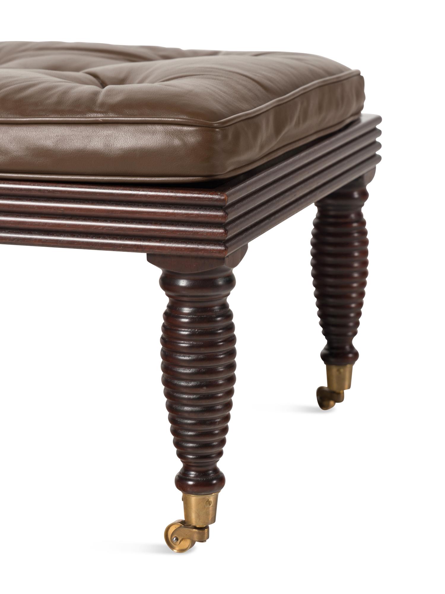 A Pair of English Mahogany and Leather-Upholstered Stools