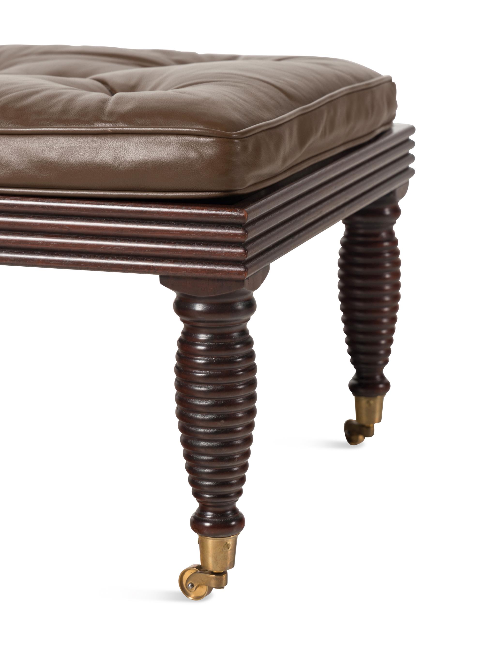 A Pair of English Mahogany and Leather-Upholstered Stools