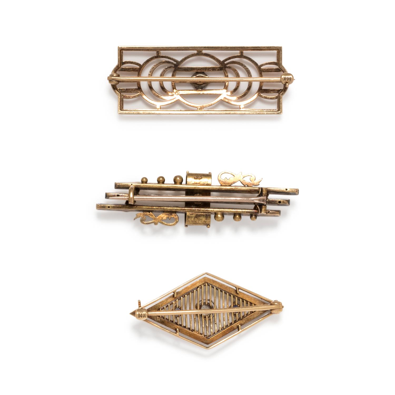 COLLECTION OF ANTIQUE YELLOW GOLD BROOCHES