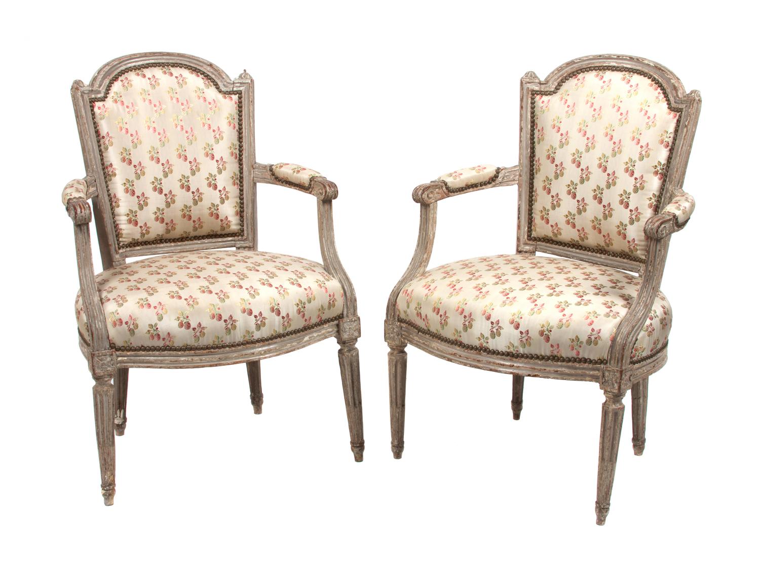 A Pair of Louis XVI Style Cream Painted Fauteuil Height 24 inches.