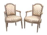 A Pair of Louis XVI Style Cream Painted Fauteuil Height 24 inches.
