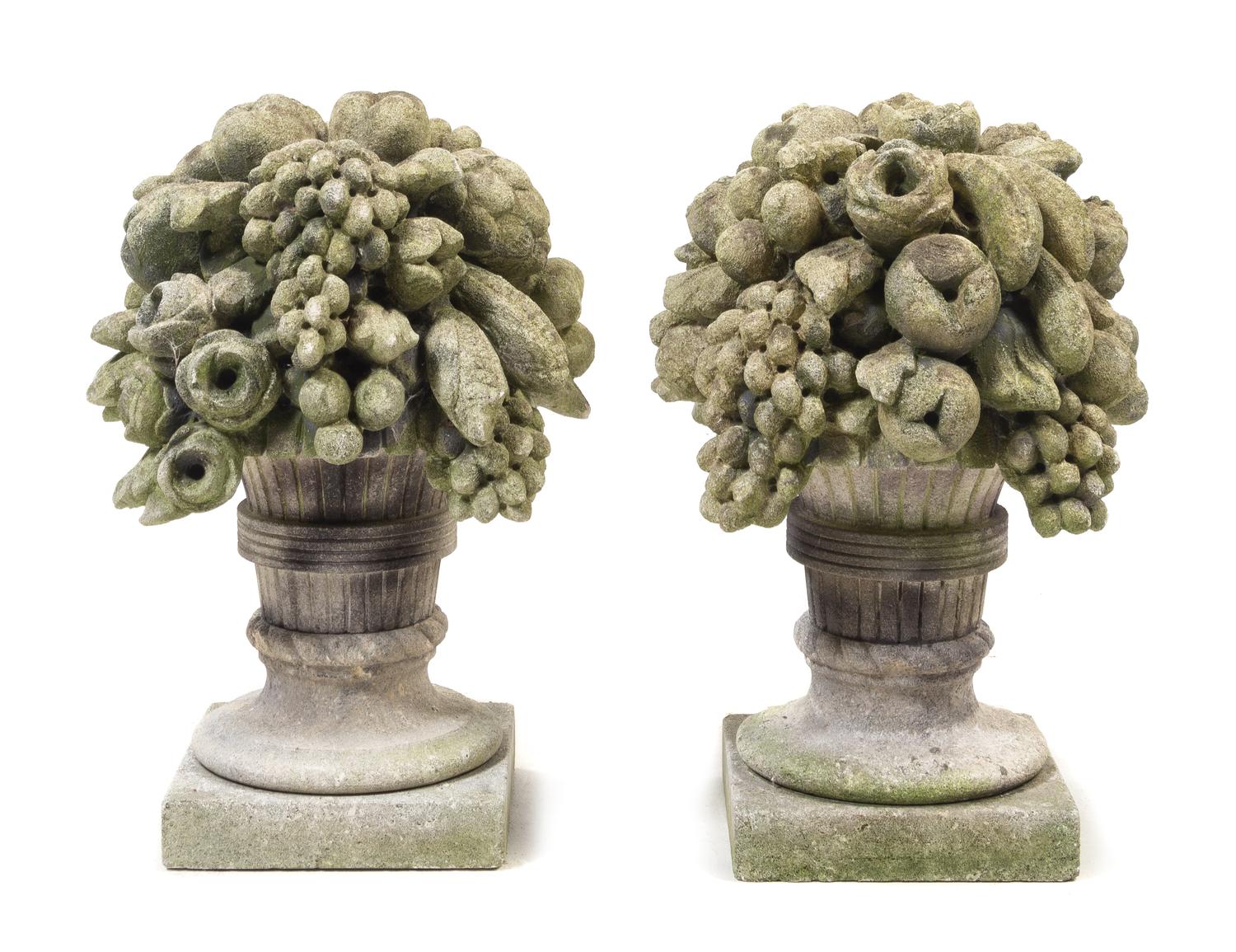 A Pair of Cast Stone Garden Models of Fruit-Filled Urns Height 21 1/2 inches. — 20TH CENTURY