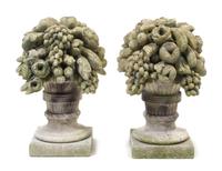 A Pair of Cast Stone Garden Models of Fruit-Filled Urns Height 21 1/2 inches. — 20TH CENTURY