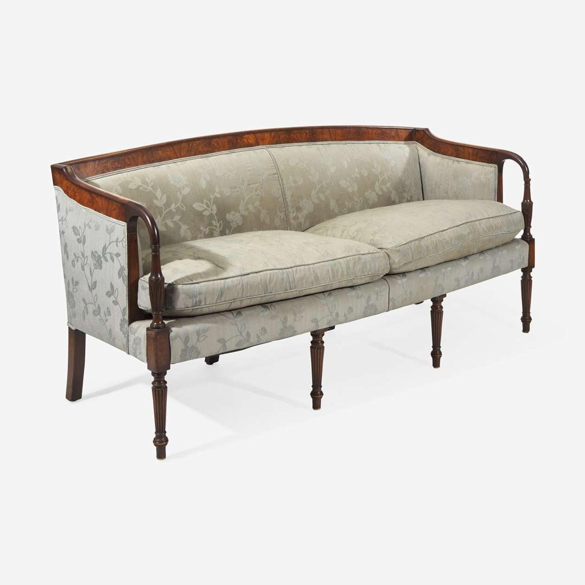 A Federal style carved and inlaid mahogany sofa