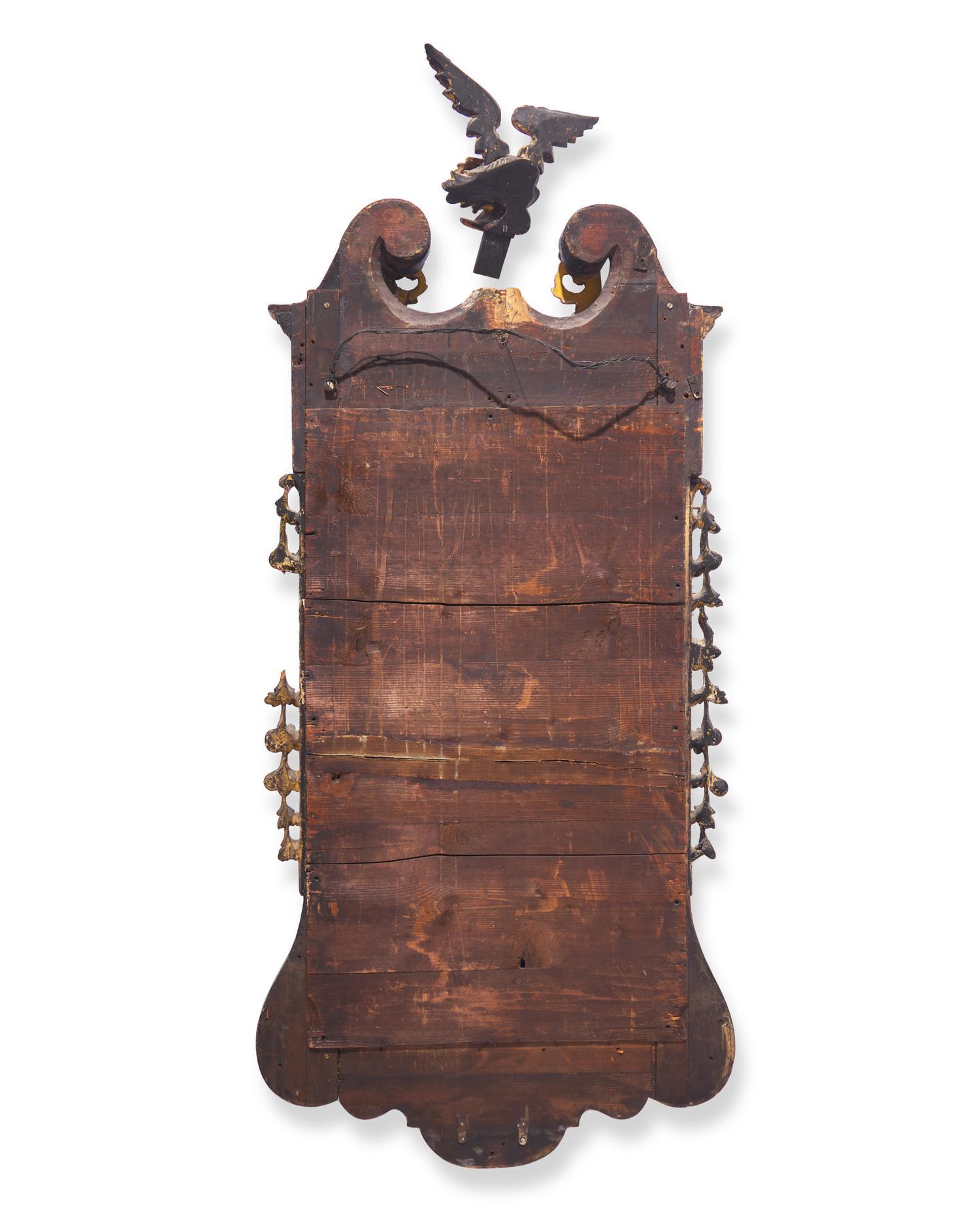 A Large Chippendale Parcel-Gilt And Mahogany-Veneered Looking Glass