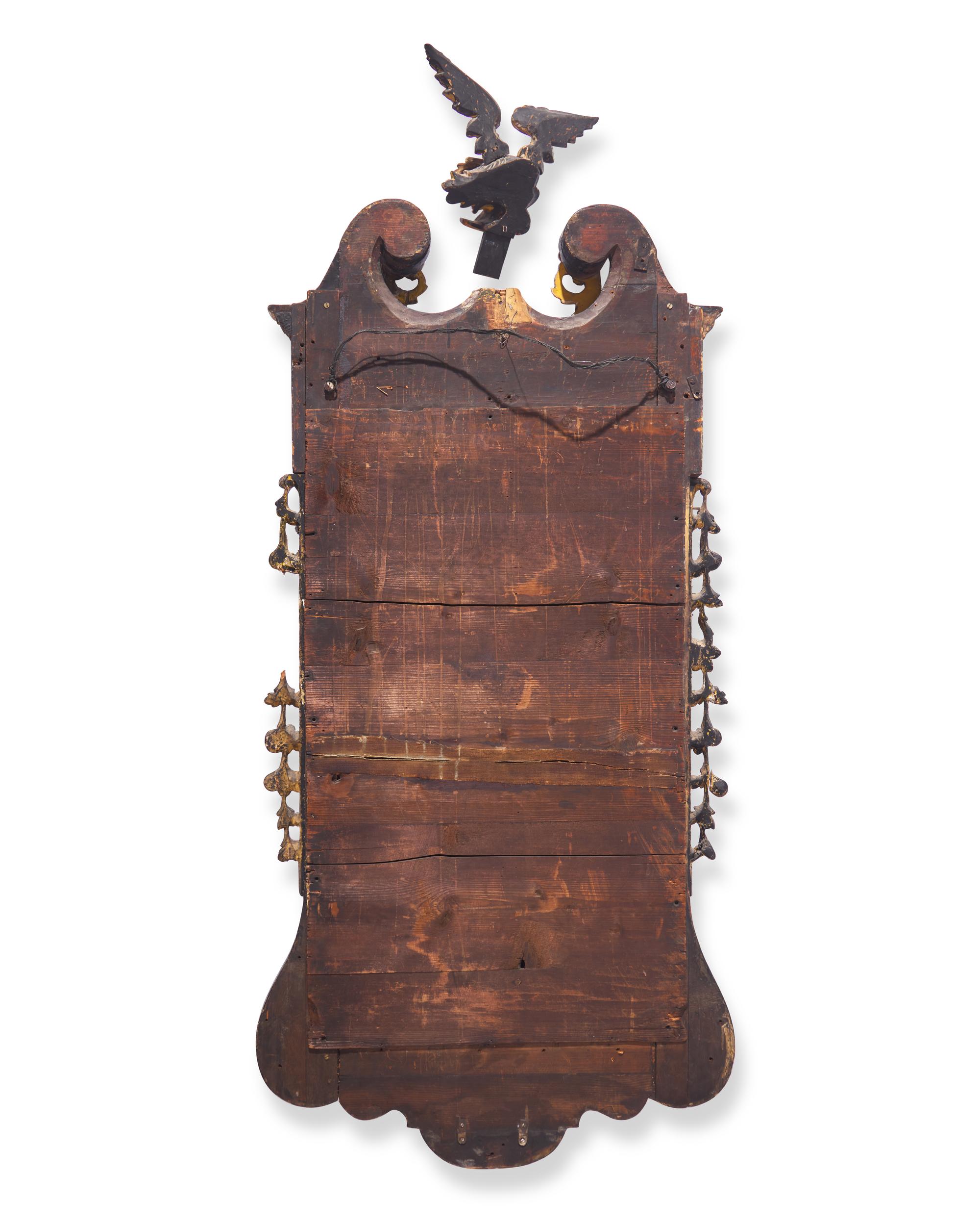A Large Chippendale Parcel-Gilt And Mahogany-Veneered Looking Glass
