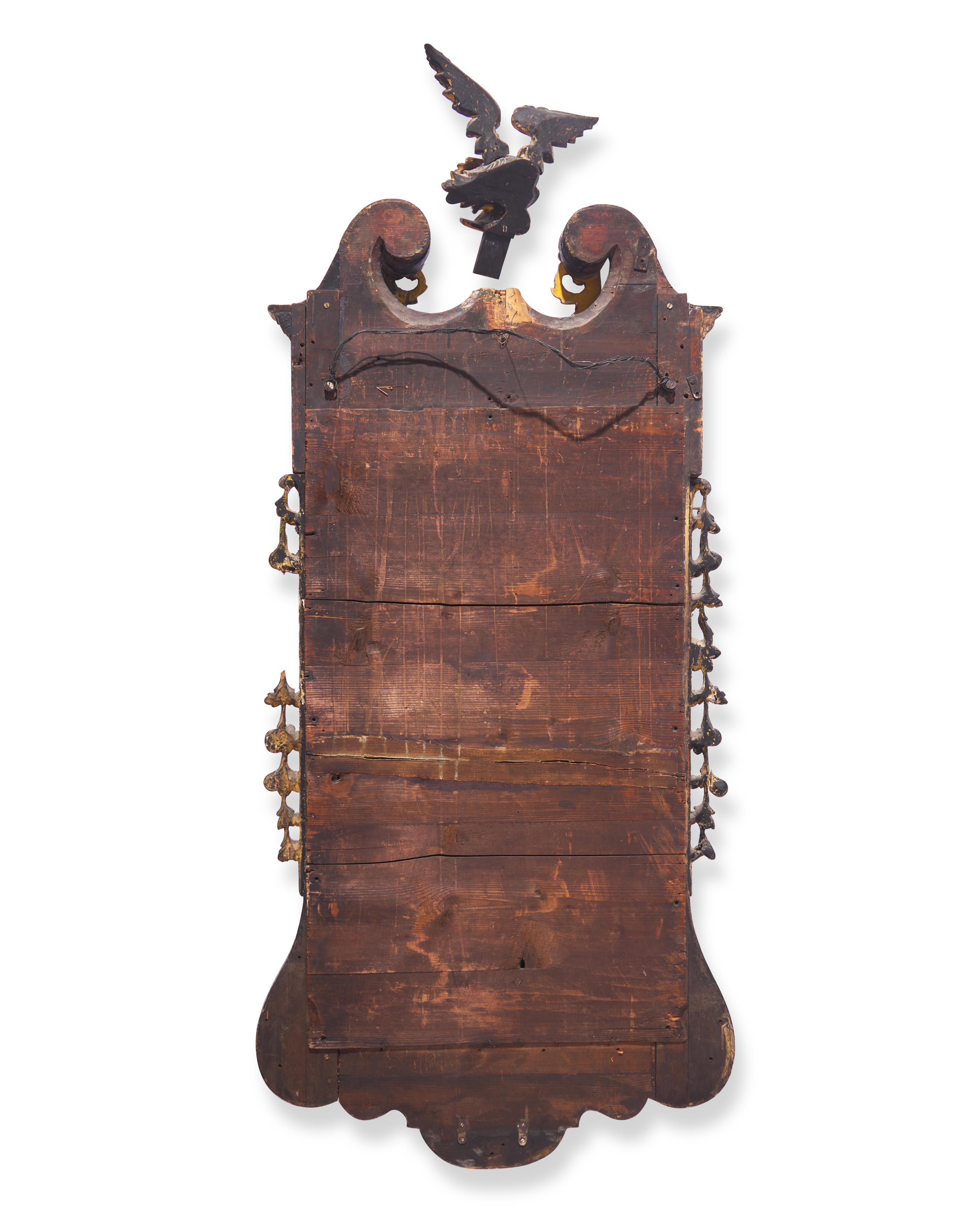 A Large Chippendale Parcel-Gilt And Mahogany-Veneered Looking Glass