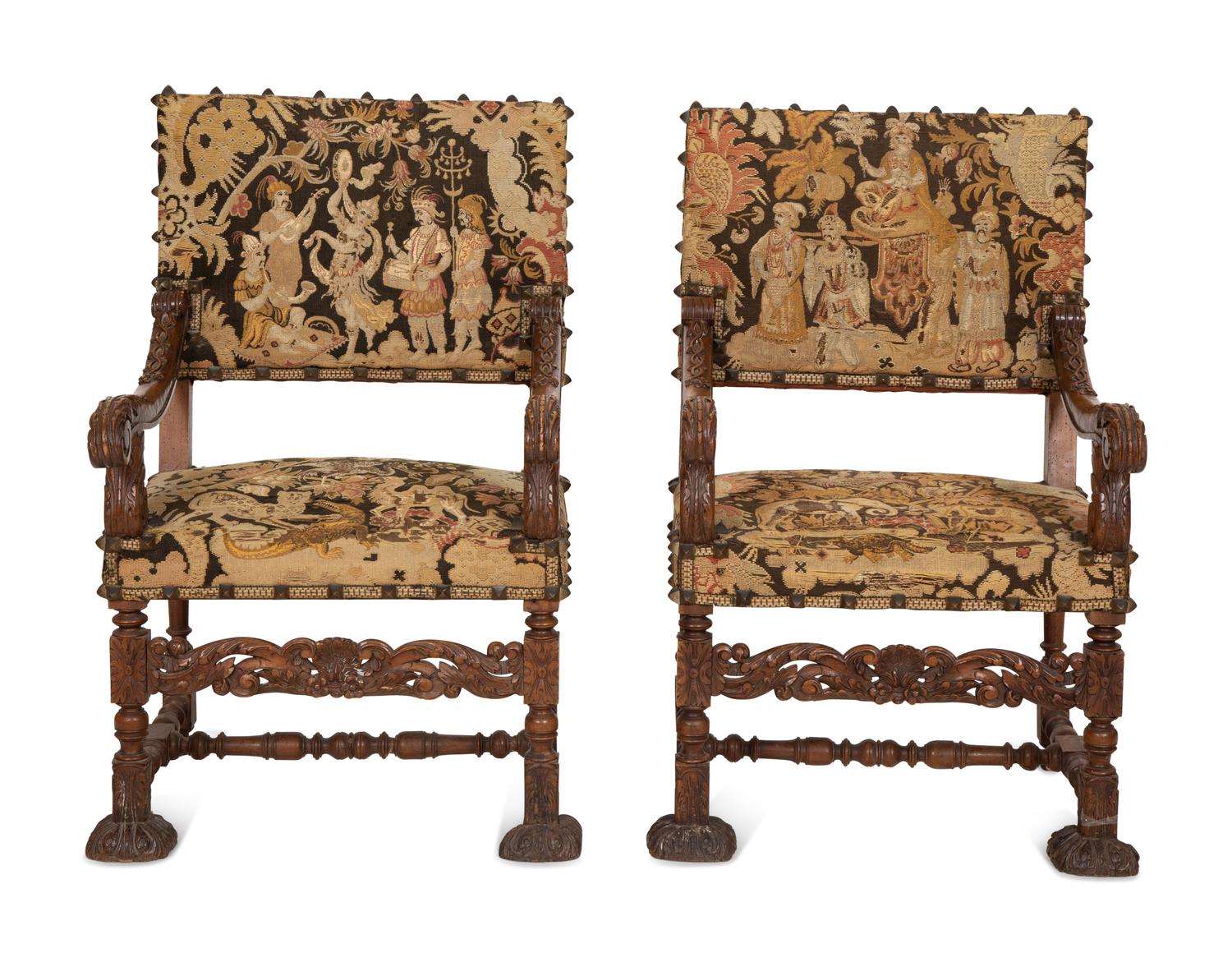 A Pair of English Baroque Style Carved Walnut Armchairs with Needlepoint Upholstery
