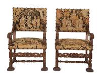 A Pair of English Baroque Style Carved Walnut Armchairs with Needlepoint Upholstery